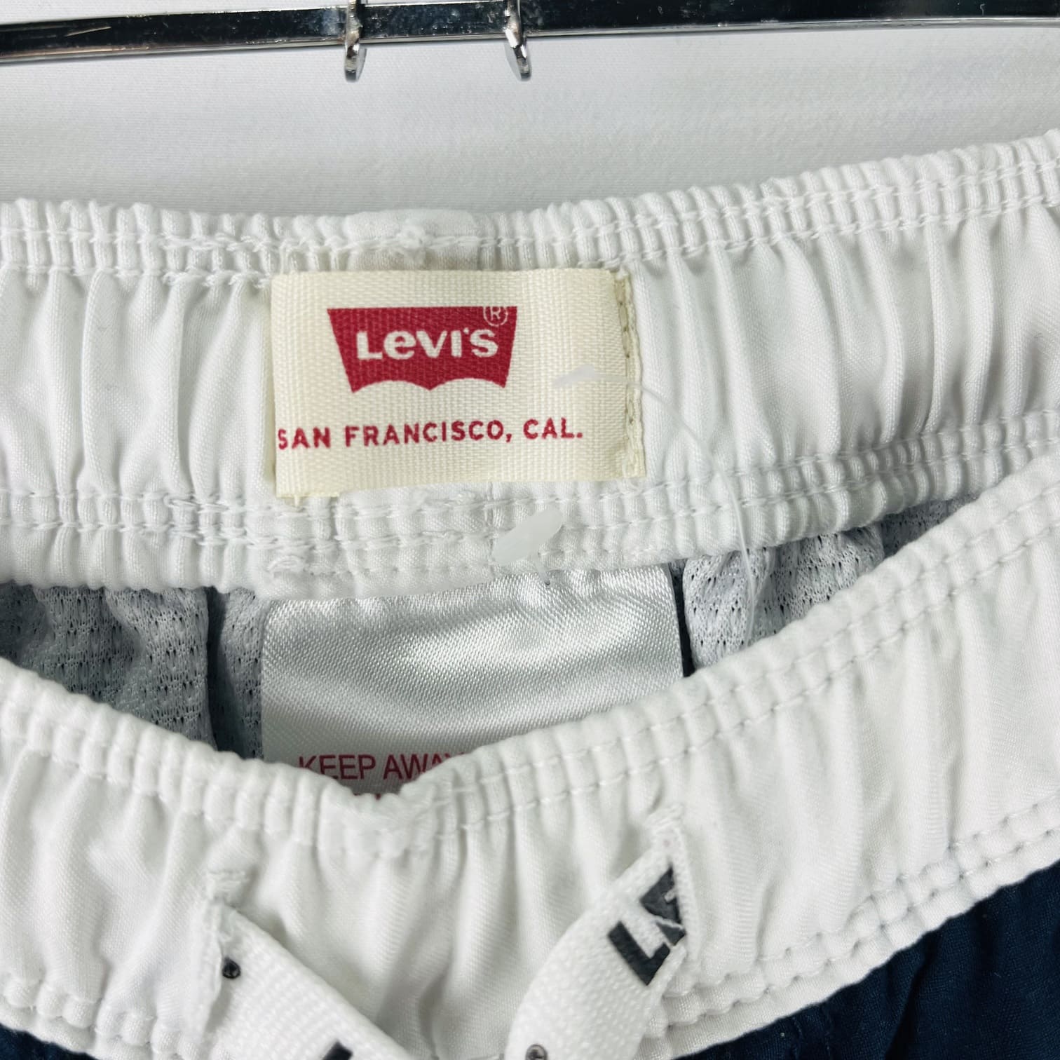 il-etait-une-seconde-fois-boutique-seconde-main-enfants-maillot-de-bain-garcon-10-12-ans-Levis-etiquette